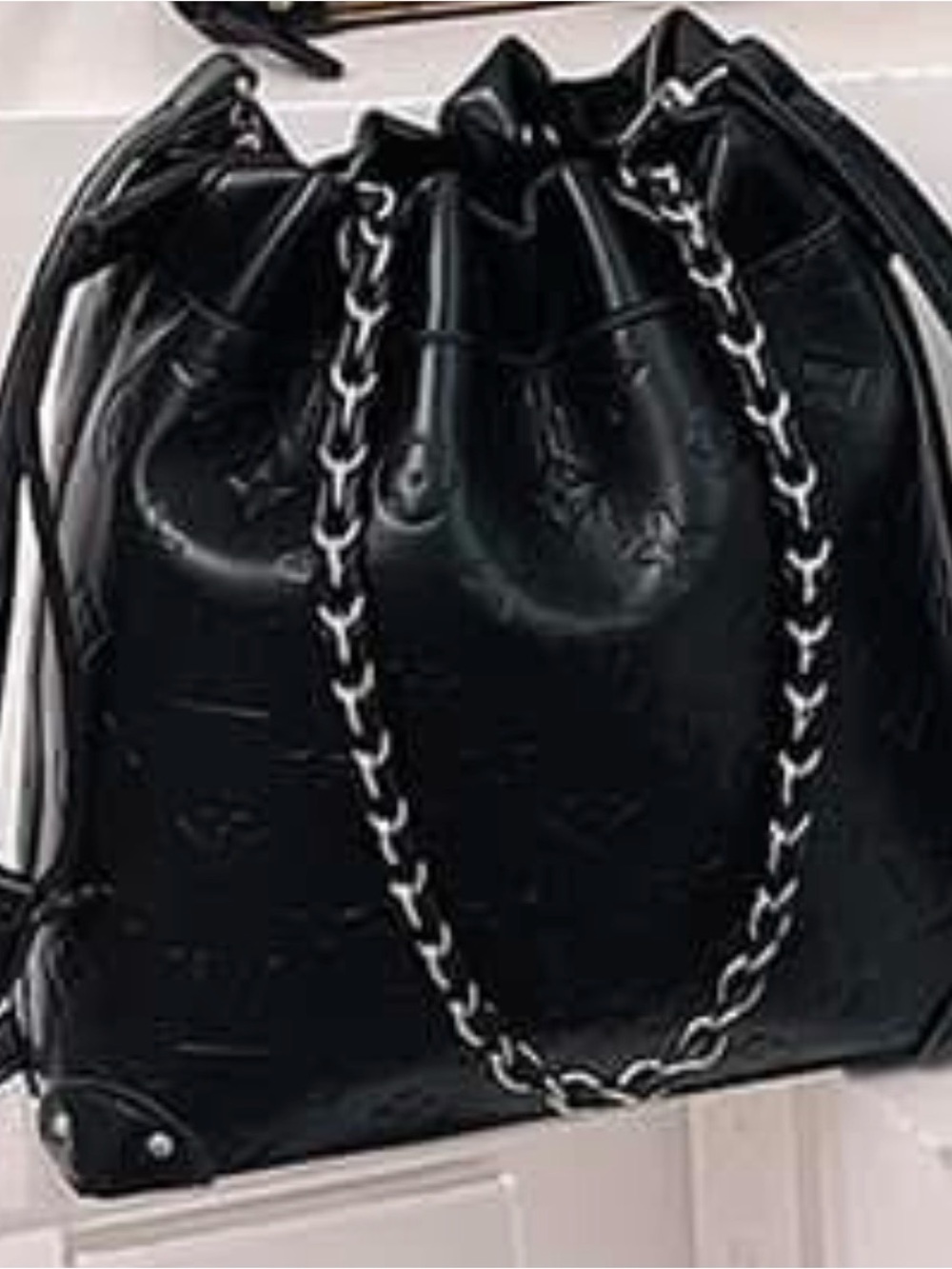 Small Black Quilted Drawstring Shoulder Bag with Chain Strap